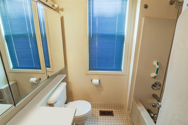 full bathroom featuring bathtub / shower combination, vanity, toilet, and tile patterned flooring