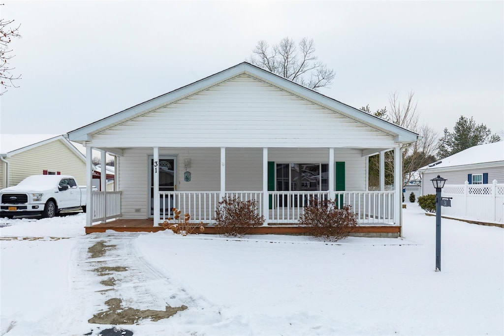 bungalow featuring a porch