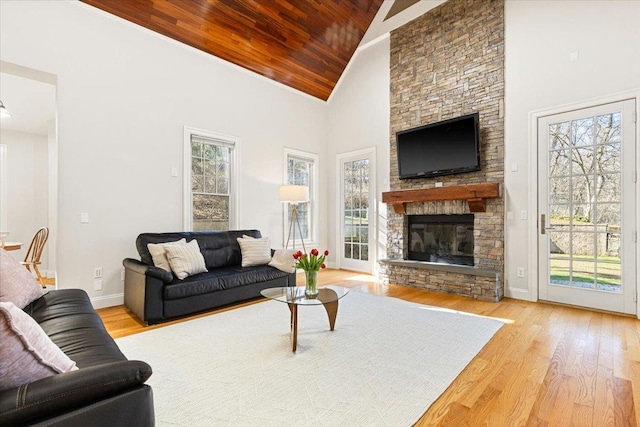 699 Ardsley Rd, Scarsdale, NY 10583 - living room featuring wood finished floors, high vaulted ceiling, and baseboards
