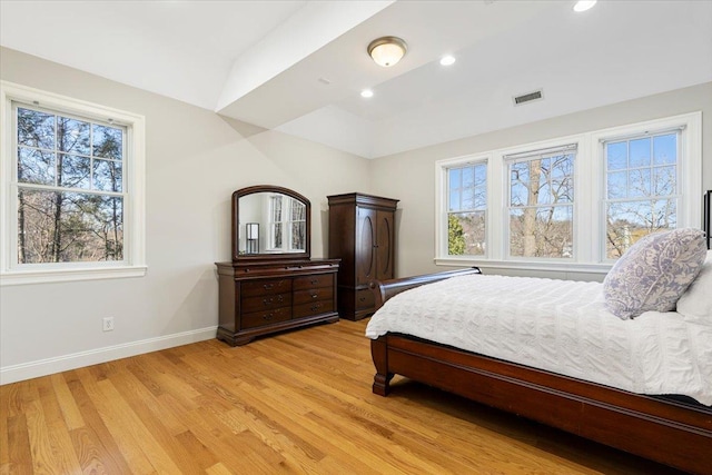 699 Ardsley Rd, Scarsdale, NY 10583 - bedroom featuring light wood-type flooring, visible vents, multiple windows, and baseboards