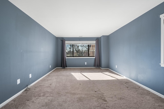 view of carpeted spare room