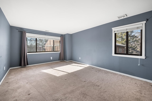 view of carpeted spare room