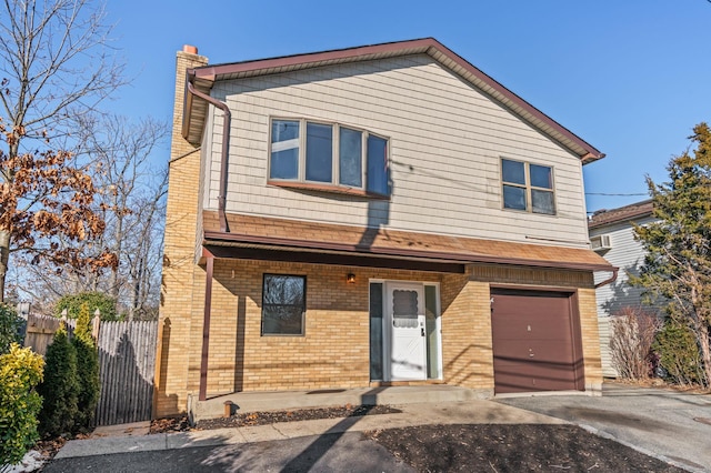 view of front of home with a garage