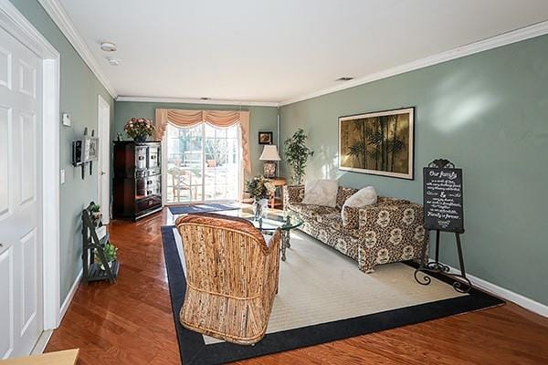 living room featuring crown molding and dark hardwood / wood-style floors