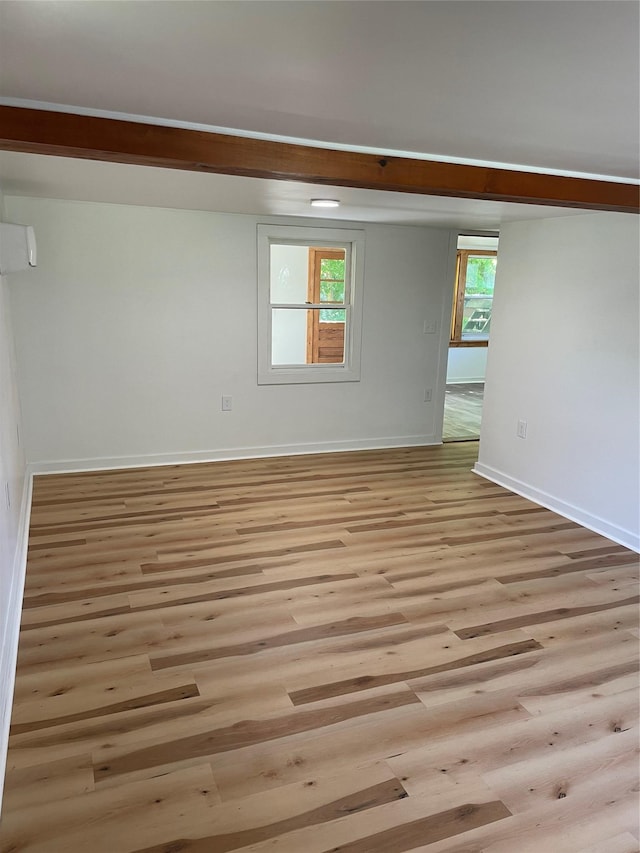 empty room with light wood-type flooring