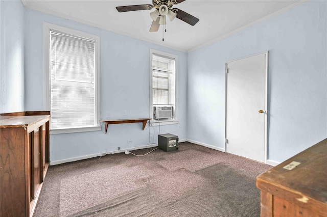 carpeted empty room featuring cooling unit and ceiling fan