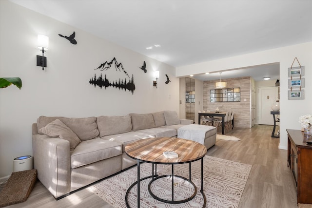 living room with light hardwood / wood-style flooring