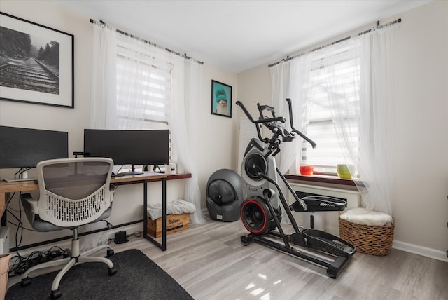 office space with light hardwood / wood-style floors