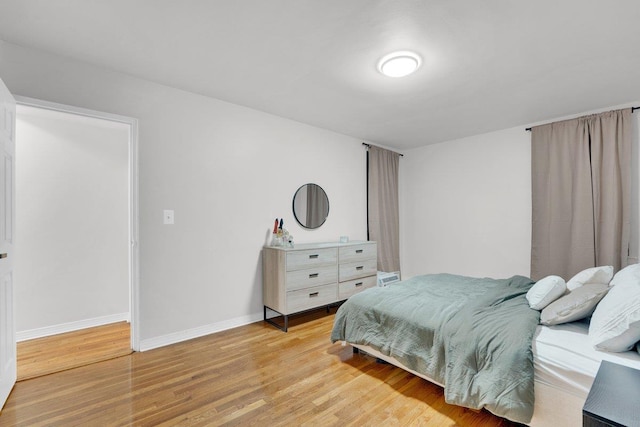 bedroom featuring light hardwood / wood-style floors