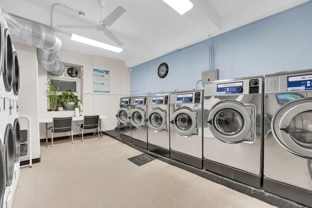 laundry room with ceiling fan and washing machine and dryer