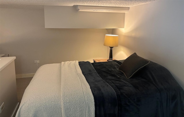 1 Landmark Sq Unit 302, Port Chester, NY 10573 - bedroom with a textured ceiling