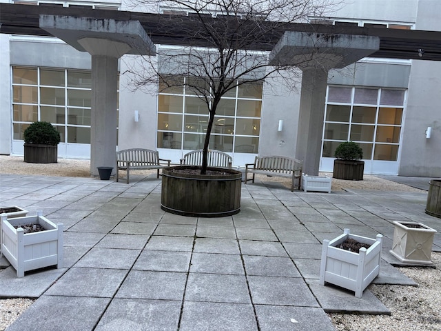 1 Landmark Sq Unit 302, Port Chester, NY 10573 - view of patio featuring an outdoor fire pit