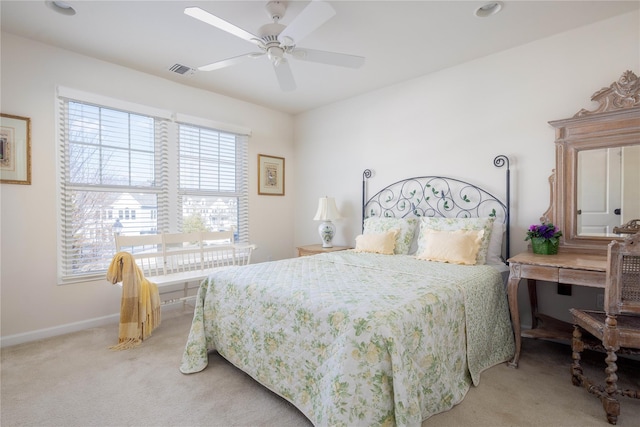 carpeted bedroom with ceiling fan