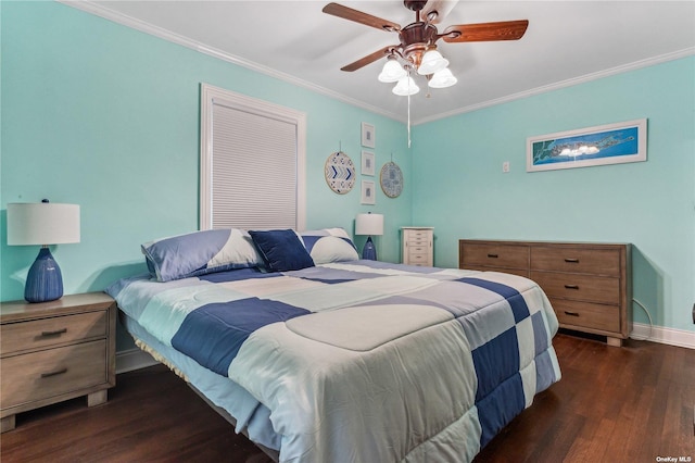 bedroom featuring crown molding, dark wood-type flooring, and ceiling fan