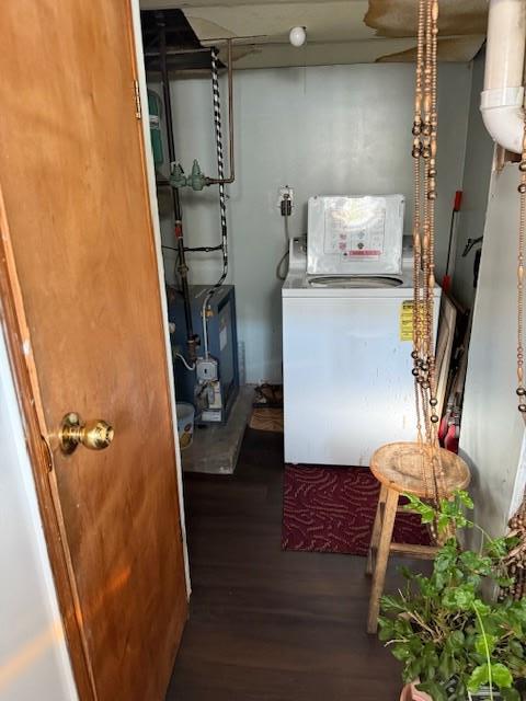 laundry area featuring washer / clothes dryer and dark wood-type flooring