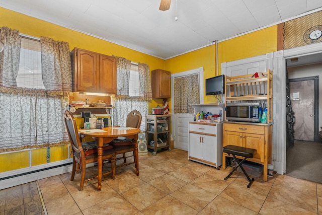 kitchen featuring ceiling fan