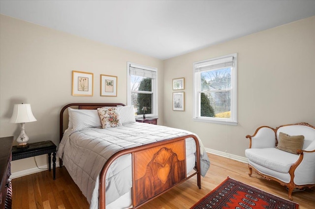 bedroom featuring light wood-type flooring