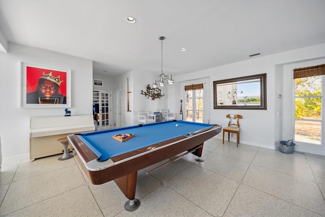 playroom featuring plenty of natural light, pool table, and french doors