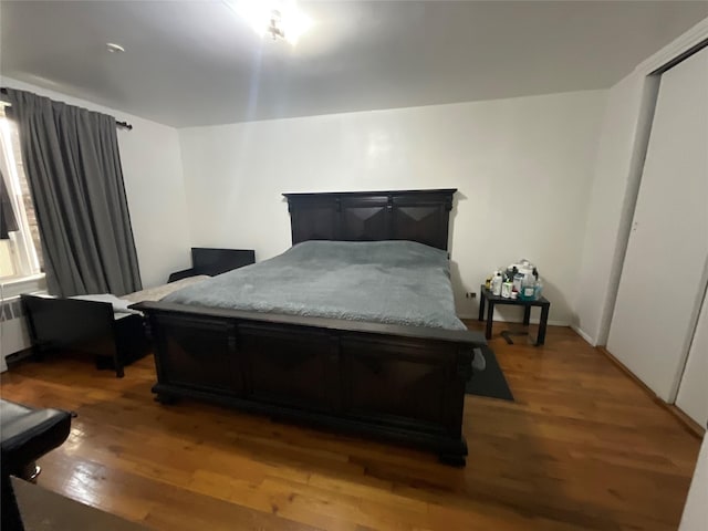 bedroom featuring hardwood / wood-style flooring