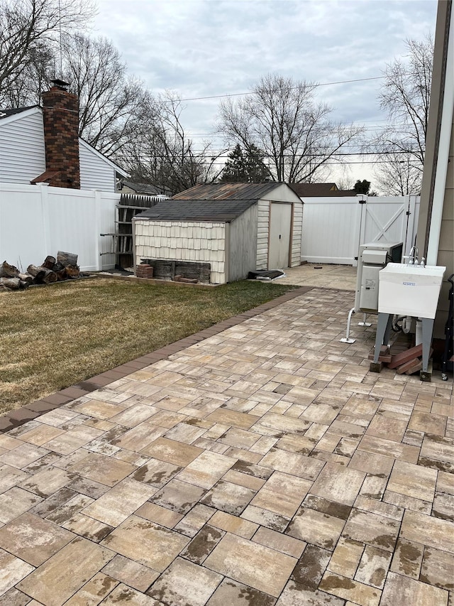 view of patio / terrace featuring a shed