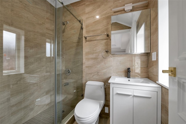 bathroom with vaulted ceiling, tile walls, vanity, an enclosed shower, and toilet