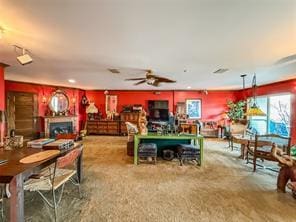 interior space featuring ceiling fan