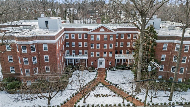 view of snow covered property