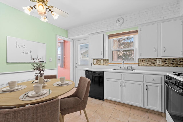 kitchen featuring sink, range with gas stovetop, white cabinets, and dishwasher