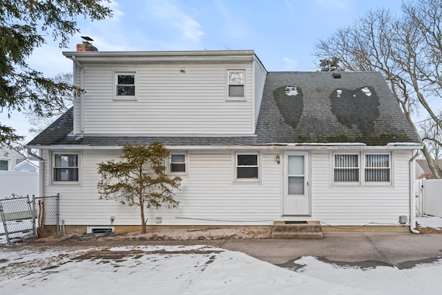 view of snow covered property