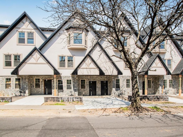 65 W 2nd St Unit 7, Mount Vernon, NY 10550 - view of front of house featuring stone siding and stucco siding