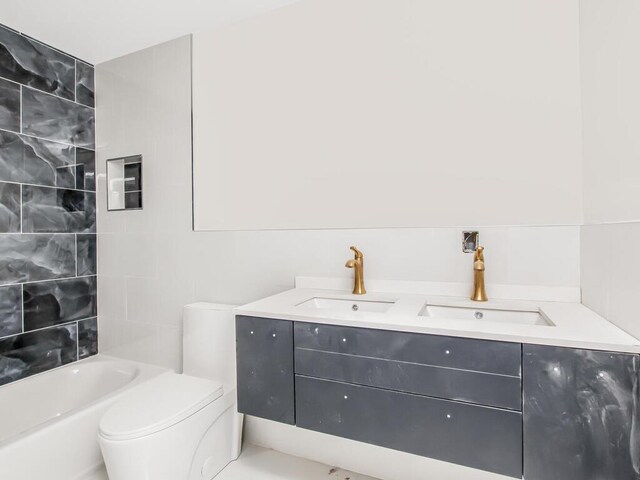 65 W 2nd St Unit 7, Mount Vernon, NY 10550 - full bath with a sink, toilet, and double vanity