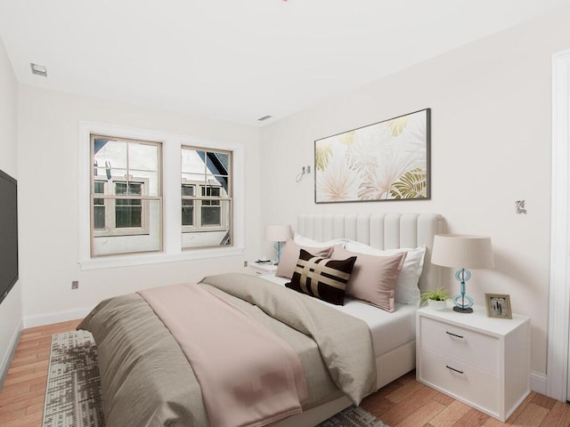 65 W 2nd St Unit 7, Mount Vernon, NY 10550 - bedroom with light wood-style floors and baseboards
