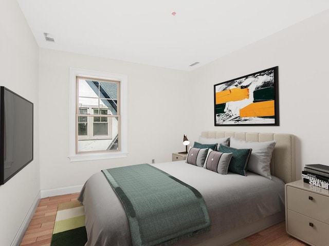 65 W 2nd St Unit 7, Mount Vernon, NY 10550 - bedroom with baseboards, visible vents, and light wood-type flooring