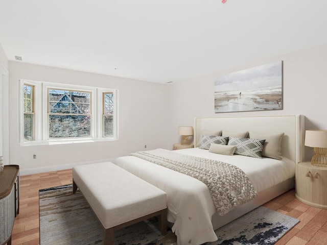 65 W 2nd St Unit 7, Mount Vernon, NY 10550 - bedroom with baseboards and light wood finished floors