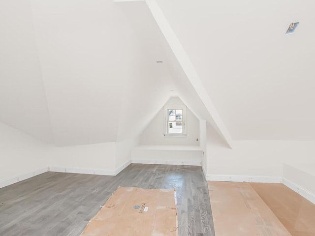 65 W 2nd St Unit 7, Mount Vernon, NY 10550 - bonus room with baseboards, wood finished floors, and lofted ceiling