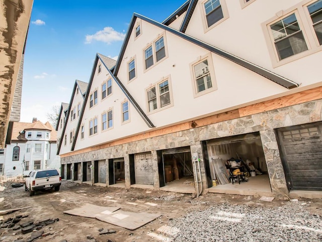 65 W 2nd St Unit 7, Mount Vernon, NY 10550 - view of building exterior featuring a garage