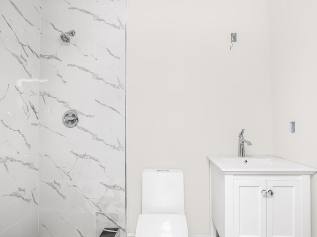 65 W 2nd St Unit 7, Mount Vernon, NY 10550 - bathroom with vanity, a marble finish shower, and toilet