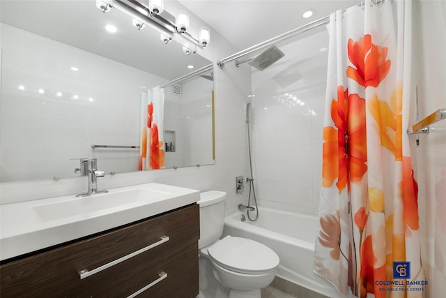 full bathroom featuring vanity, toilet, and shower / bath combo with shower curtain