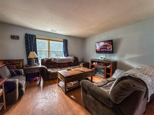 living room featuring hardwood / wood-style floors