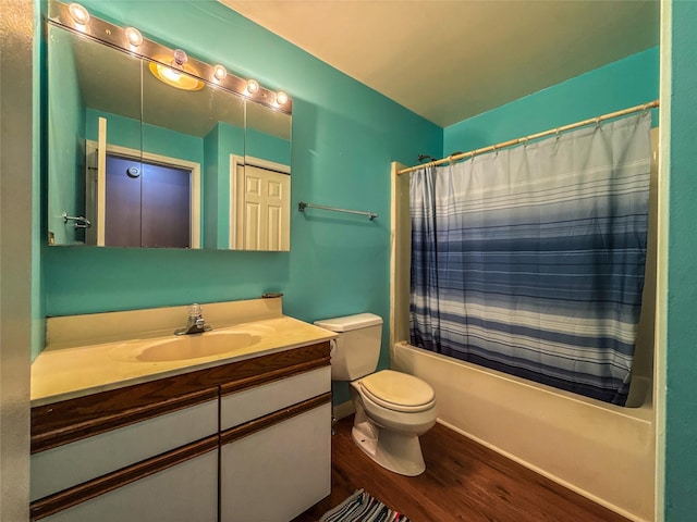 full bathroom featuring shower / bath combination with curtain, wood-type flooring, toilet, and vanity