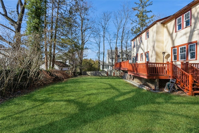 view of yard with a deck