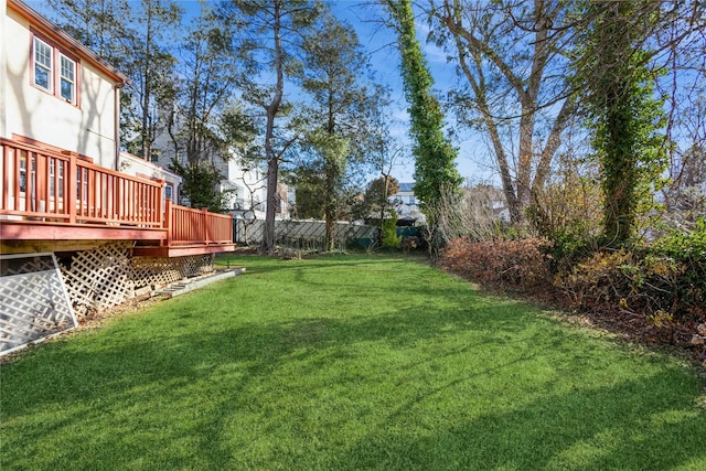 view of yard featuring a deck