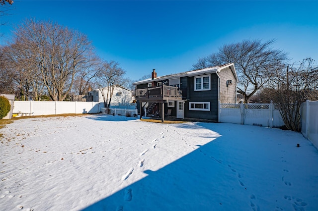 view of snow covered property