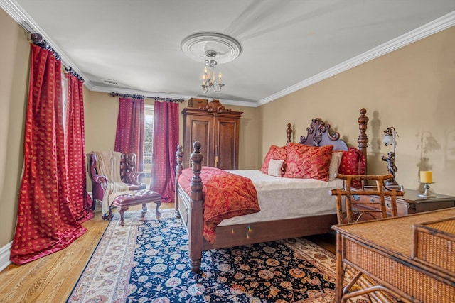 183 Mill Spring Rd, Manhasset, NY 11030 - bedroom with ornamental molding, visible vents, and wood finished floors