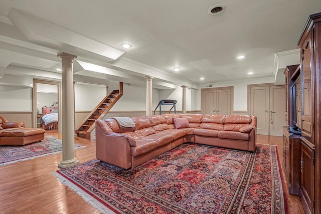 183 Mill Spring Rd, Manhasset, NY 11030 - living area with a wainscoted wall, decorative columns, stairway, light wood-style floors, and recessed lighting