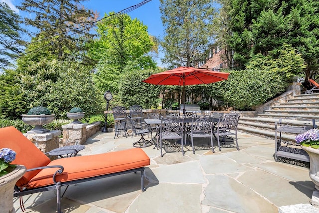 183 Mill Spring Rd, Manhasset, NY 11030 - view of patio / terrace featuring stairs and outdoor dining area