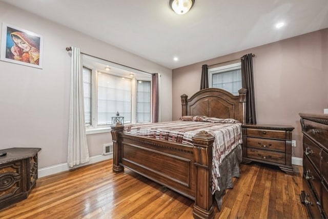 bedroom featuring hardwood / wood-style flooring