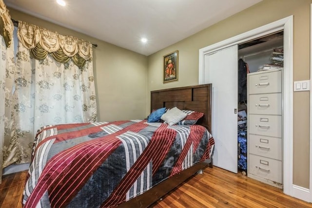 bedroom featuring wood-type flooring