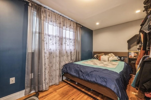 bedroom featuring light hardwood / wood-style floors