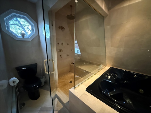 bathroom featuring independent shower and bath, tile patterned flooring, and toilet